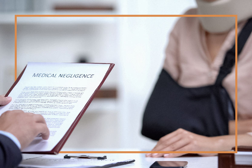 Seeking Guidance After Medical Malpractice – Teale Law Person consulting with a professional after a medical malpractice incident – Teale Law