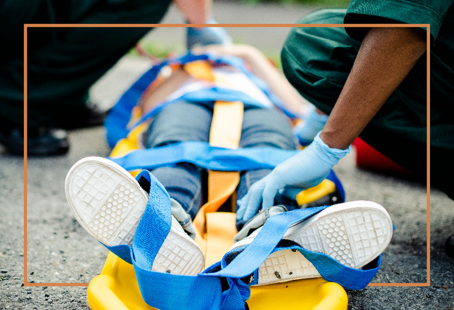 Emergency Response to Neck and Back Injury – Teale Law Person on stretcher after serious neck and back injury accident